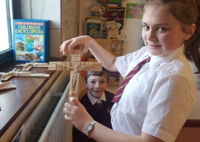 Making Crosses with Clothes pegs